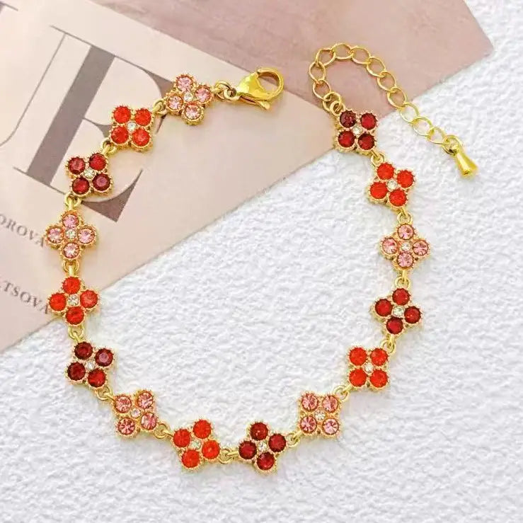 Bracelet acier doré fleurs cristaux lumineux